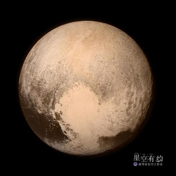 这是2015年7月14日美国国家航空航天局公布的“新视野”号探测器拍摄的冥王星照片。（新华社/法新）